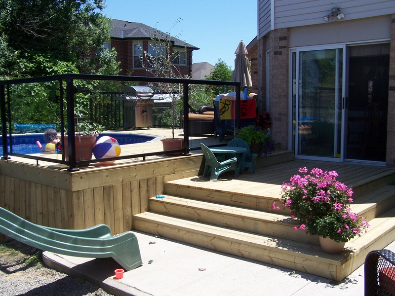 Custom pool deck/patio by GCHI